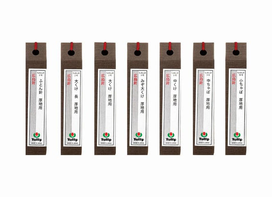 A row of brown and white boxes with red labels, each containing text in Japanese.