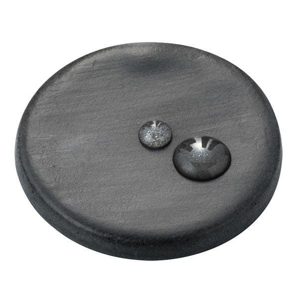 a black, round, and shiny object with two small, round, and shiny spots on it, placed on a white background.