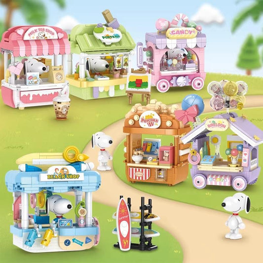 A collection of colorful toy shops and a toy dog in a park setting, featuring various toys and accessories.