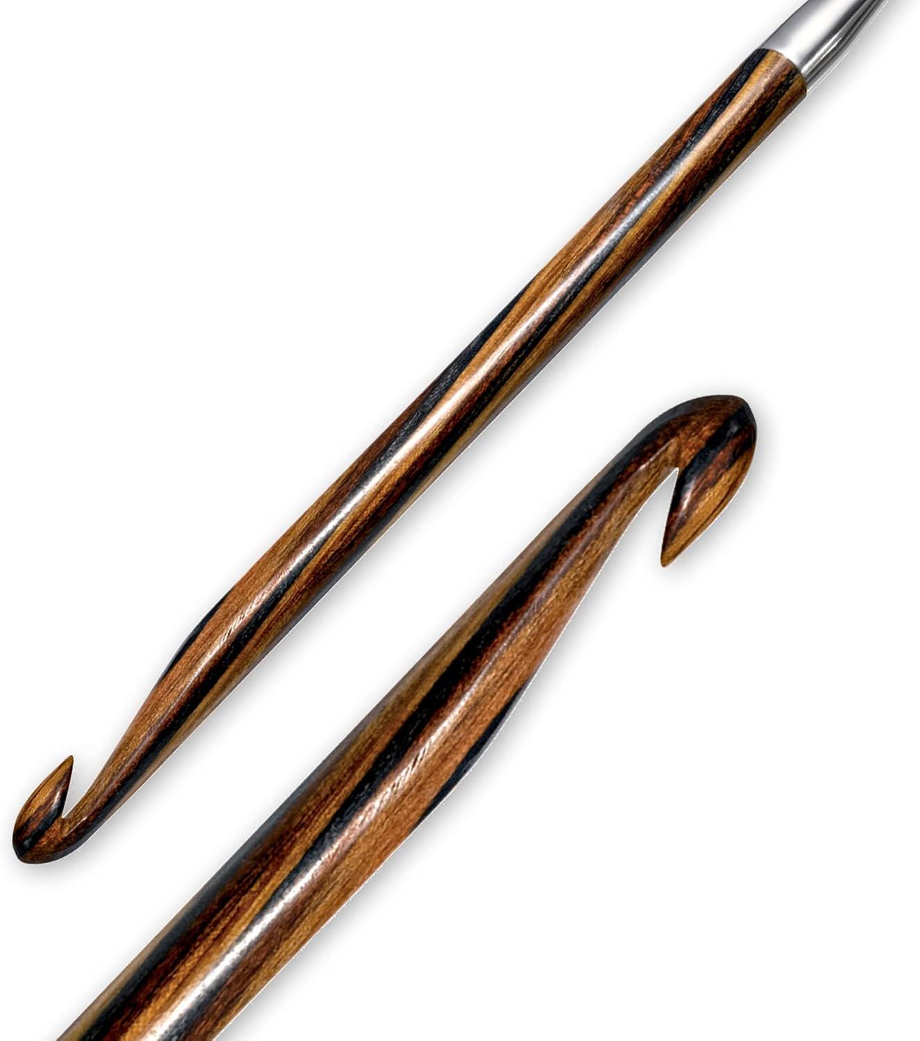 a wooden crochet hook with a curved hook and a wooden handle.