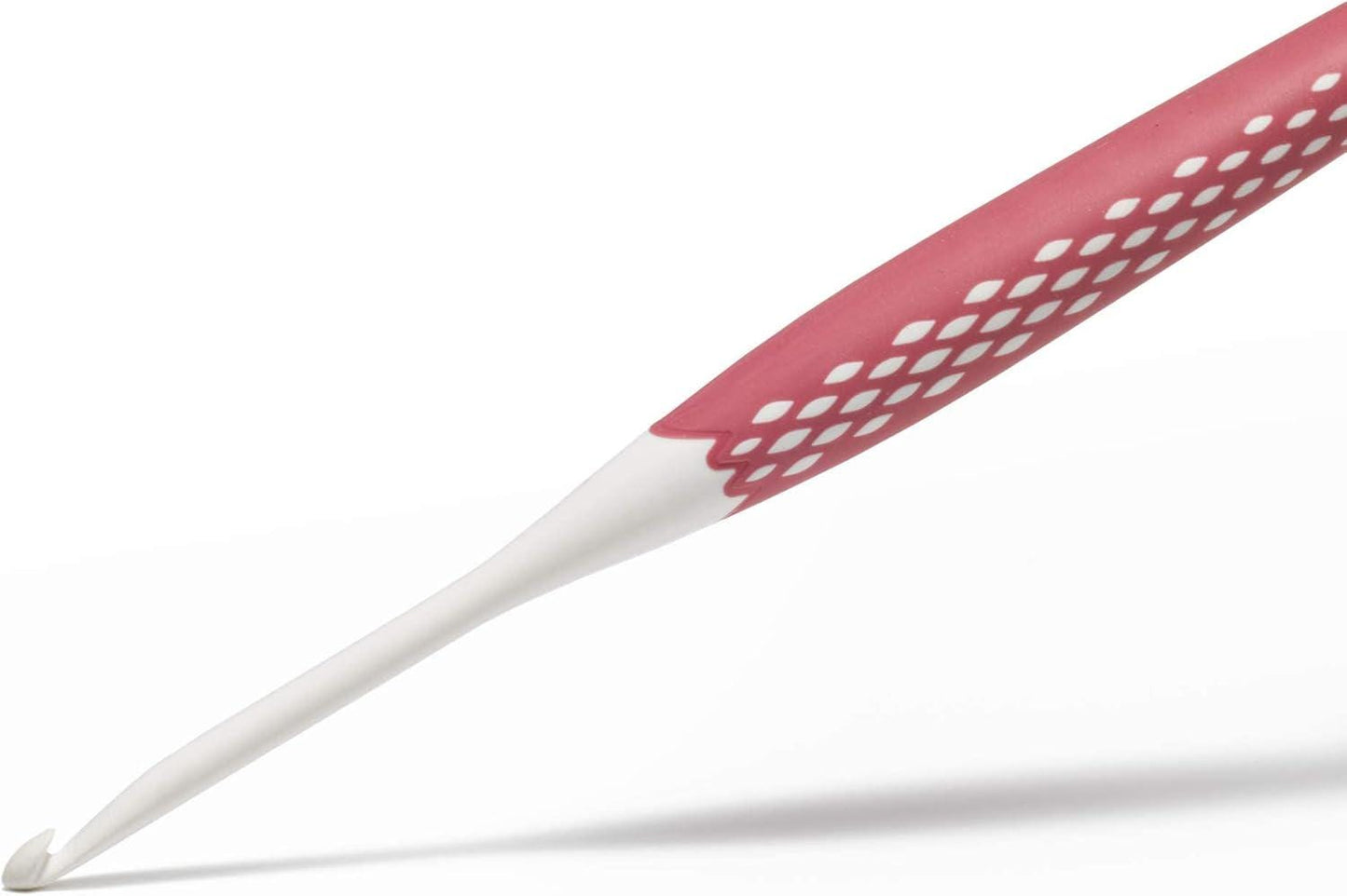 A red crochet hook with a white handle is shown against a white background.