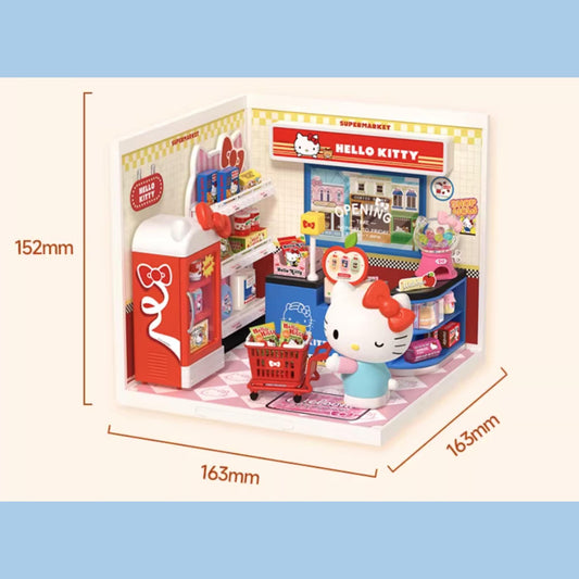 The image is a miniature model of a Hello Kitty store, featuring a Hello Kitty doll, a Hello Kitty vending machine, and various other Hello Kitty-themed items. The dimensions of the model are 152mm in length and 163mm in width.