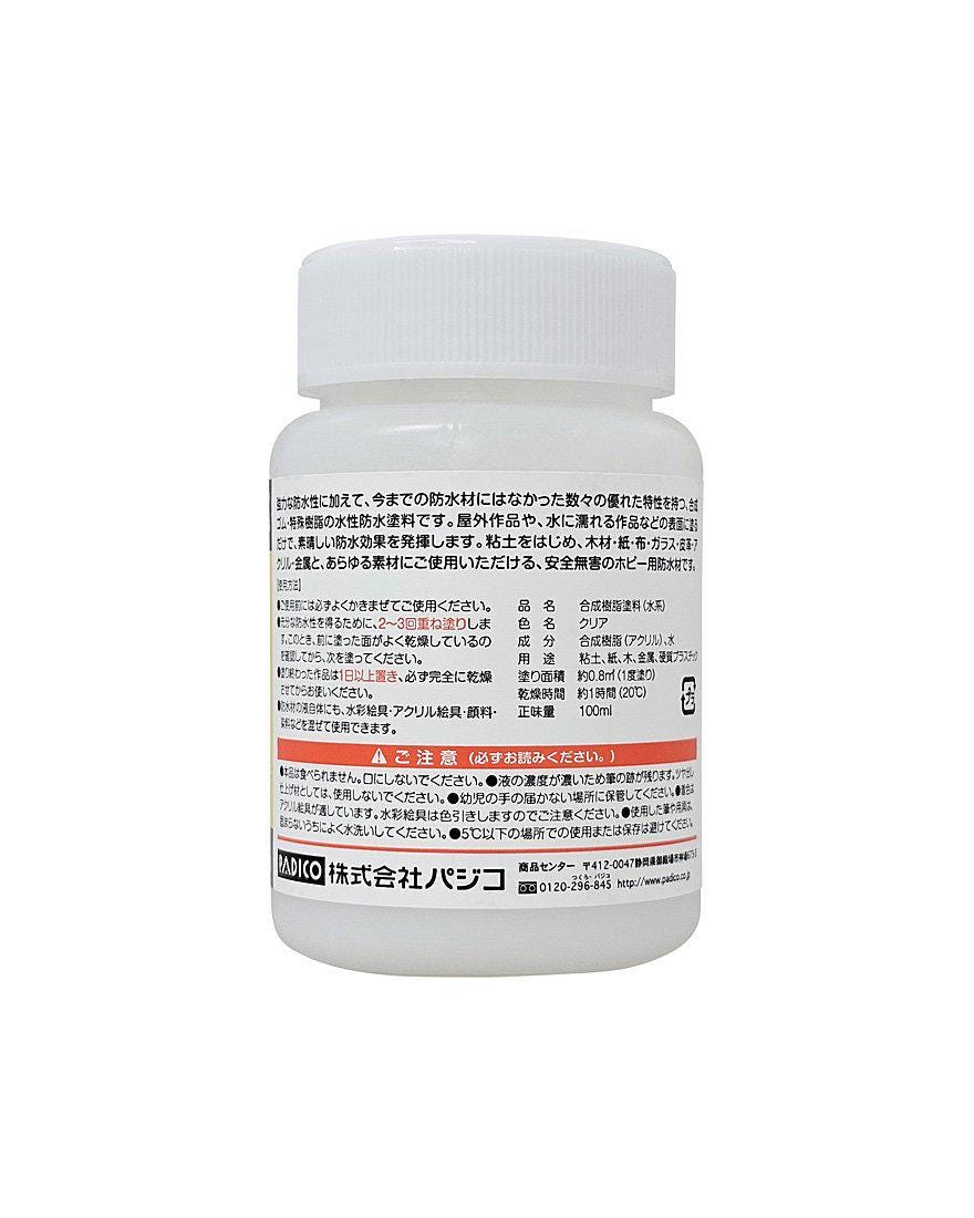 a white bottle with Japanese text on it, which appears to be a product label or packaging.