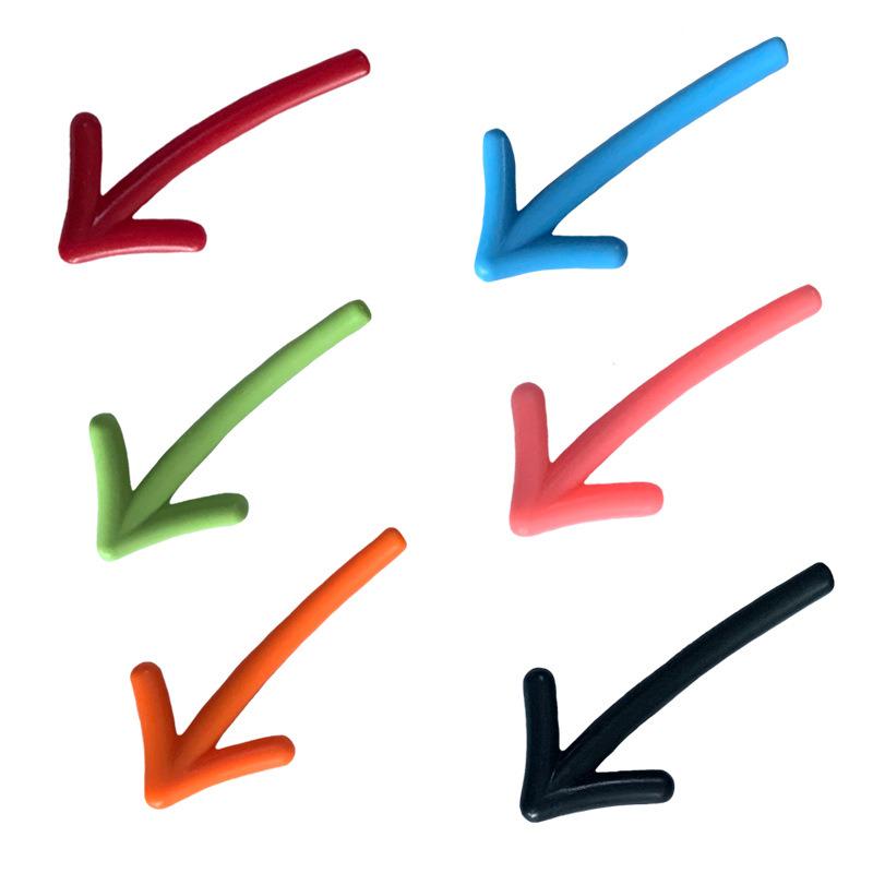 six arrows, each with a different color and orientation, arranged in a grid-like pattern against a white background.
