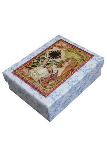 a decorative box with a floral pattern and an illustration of a woman on the lid.