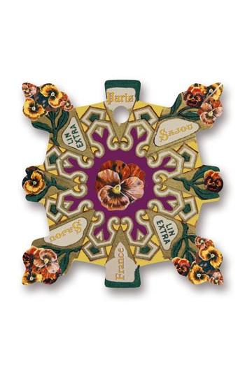 The image is a decorative piece featuring a flower design with a central purple flower surrounded by various other flowers and leaves in shades of yellow, orange, and green.