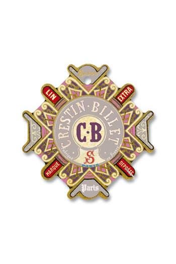 a decorative emblem with a central circular design surrounded by various text elements.