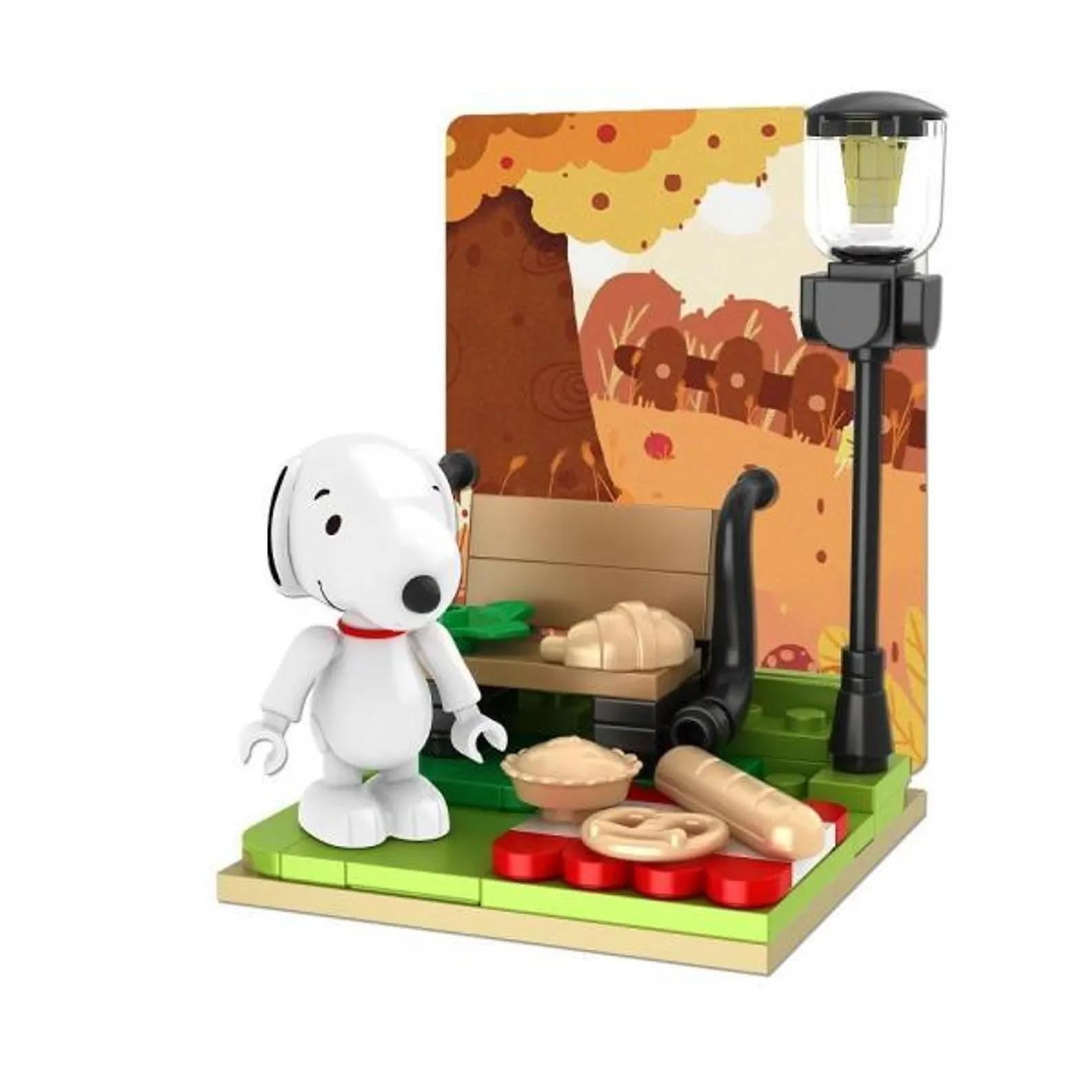 A white cartoon dog figurine is standing on a green base, surrounded by various objects such as a lamp, a bench, and some food items.
