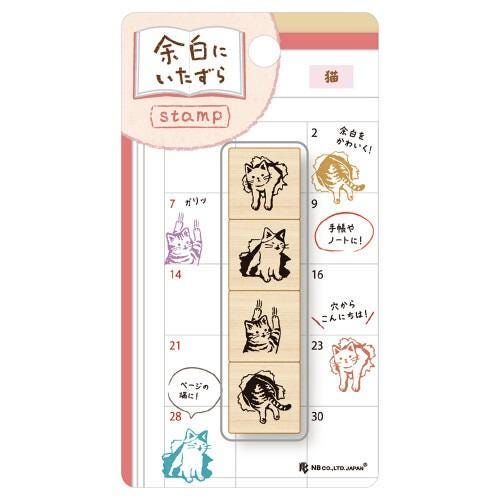 The image is a stamp with various cat illustrations, including a cat with a bow tie, a cat with a hat, and a cat with a bow tie. The stamp appears to be a creative and playful design, possibly intended for use as a decorative item or a gift.