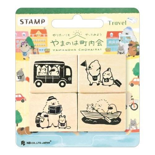 The image is a stamp set featuring various cartoon animal characters and scenes related to travel, including a bus, a boat, and a person with a backpack.