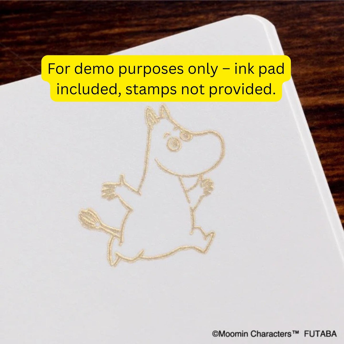 a simple illustration of a cartoon character, likely a moomin, on a white surface.