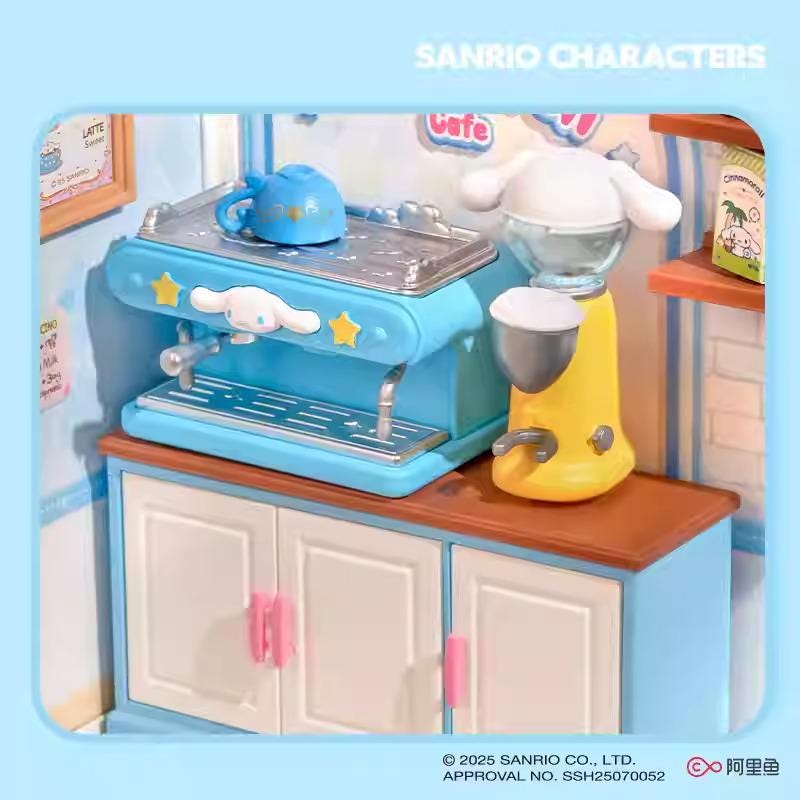 A toy kitchen set with a blue coffee machine, a yellow coffee machine, and a toy character on the counter.