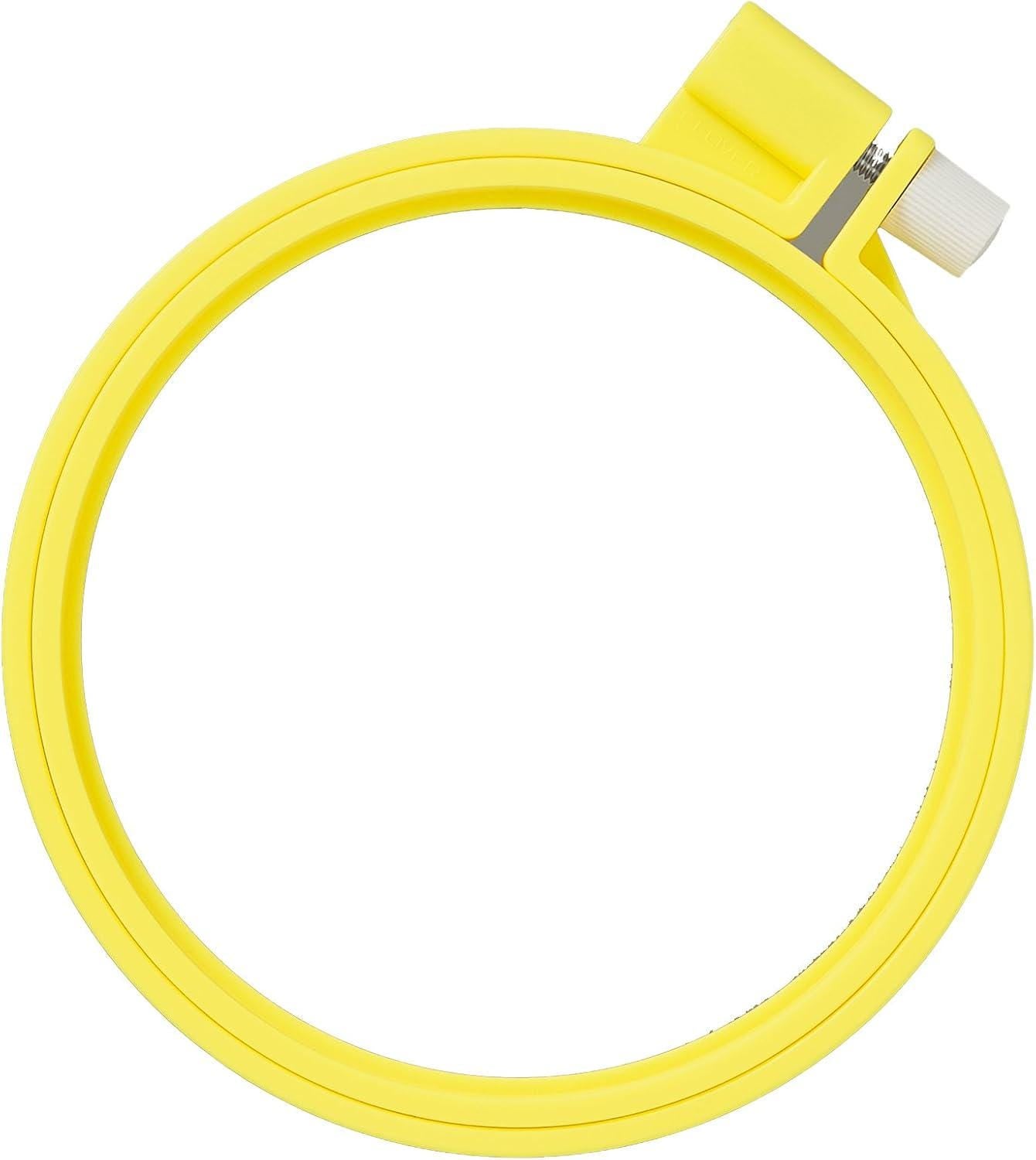 A yellow, circular embroidery hoop with a white thread attachment.