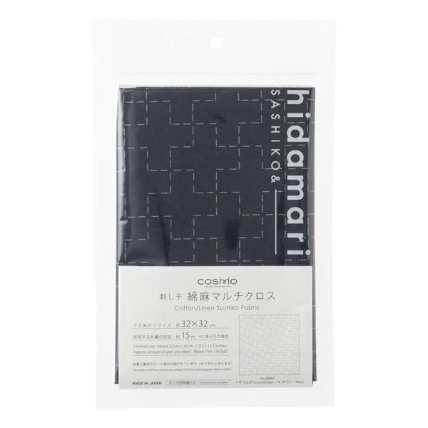 a package of fabric with a black and white checkered pattern. The package is labeled as a "Costisio Cotton/Unsashiko Fabric" and includes a label with Japanese text.