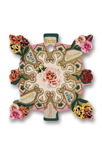 The image is a decorative piece featuring a floral design with various flowers and leaves.