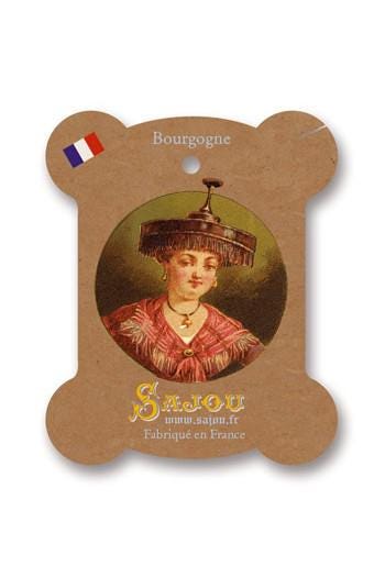 a portrait of a woman wearing a hat, with the text "Bourgogne" and "Sajou" printed on a wooden frame.