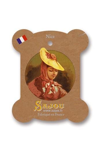 a woman wearing a red dress and a yellow hat, with a French flag sticker on the top left corner.