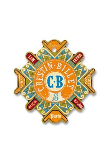 a decorative emblem with a central circular design surrounded by various geometric shapes and patterns in shades of orange, blue, and green.