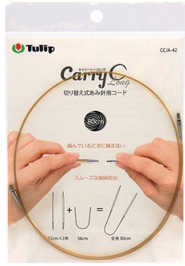 A close-up image of a hand holding a gold-colored knitting needle with a circular eye, accompanied by text and diagrams related to the knitting process.
