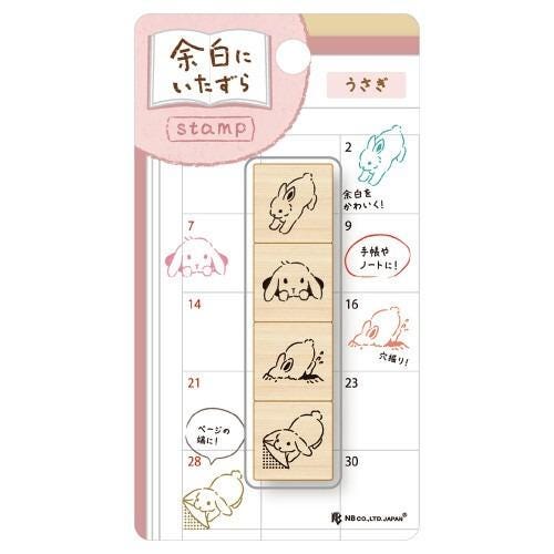 The image is a stamp featuring a series of cartoon rabbit illustrations, each with a unique pose or expression. The stamp appears to be a creative and playful design, likely intended for use in various applications such as scrapbooking, cards, or other decorative purposes.