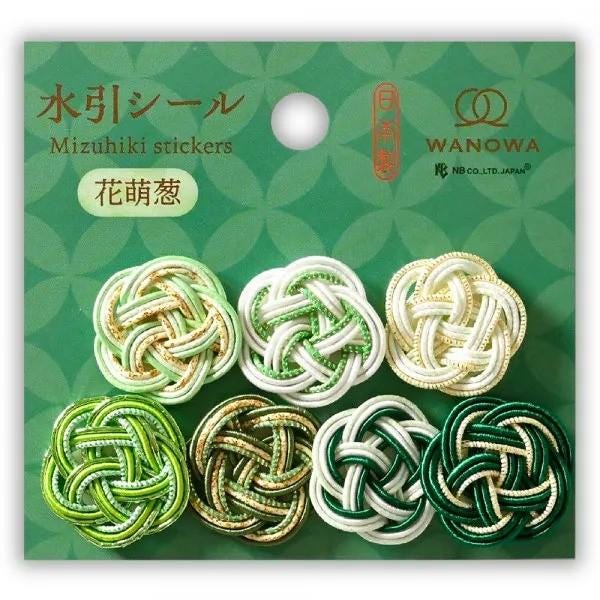 The image is a product packaging for Mizuhiki stickers, featuring a variety of green and white knotted designs.