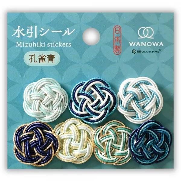 The image is a product packaging for Mizuhiki stickers, featuring various intricate knot designs in different colors such as blue, white, and gold.