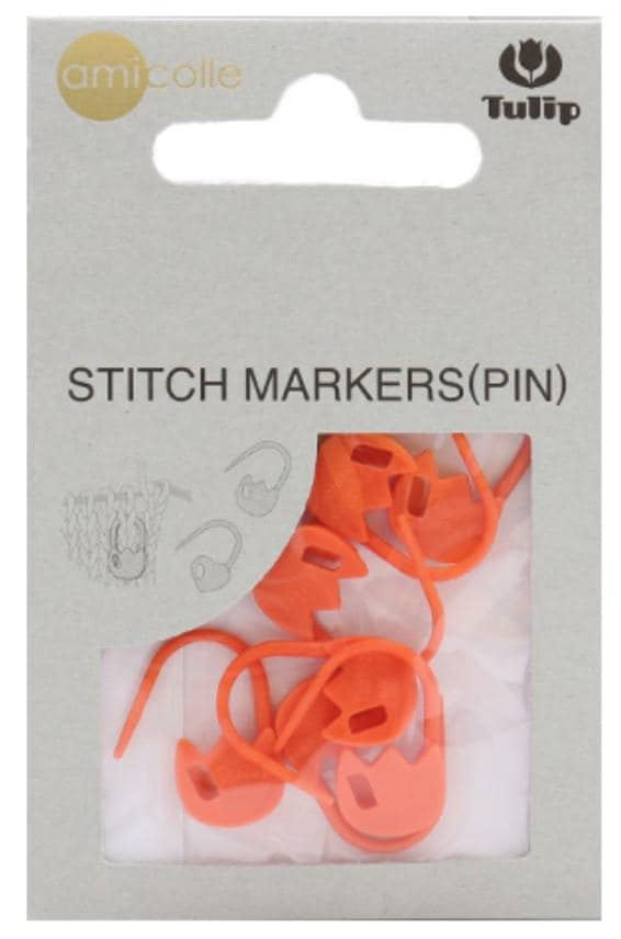 a package of orange plastic markers, which are intended to be used as pins for sewing or other crafting purposes.