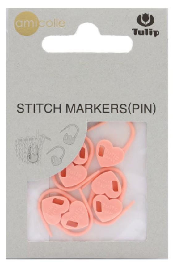 a package of pink heart-shaped sewing markers, with a clear plastic window allowing the markers to be seen.