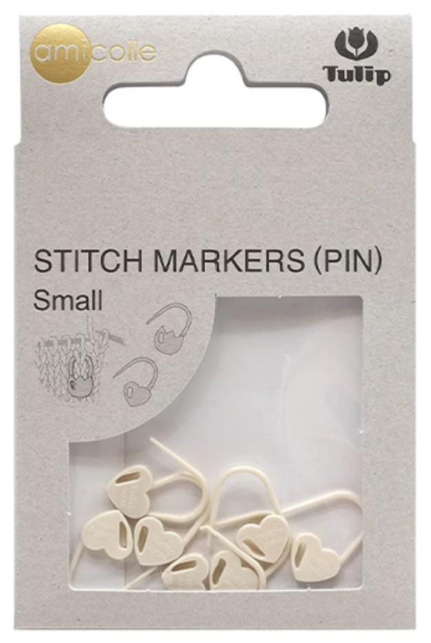 a package of small white heart-shaped sewing markers, labeled as "Stitch Markers (PIN)" and "Small".