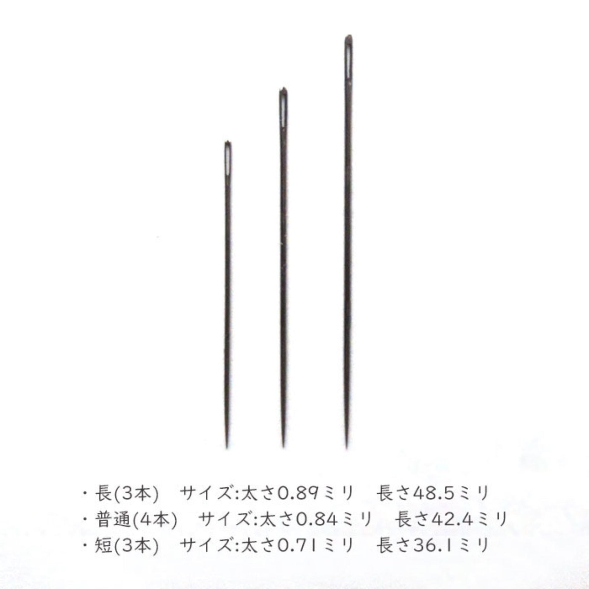 three black sewing needles arranged vertically against a white background.