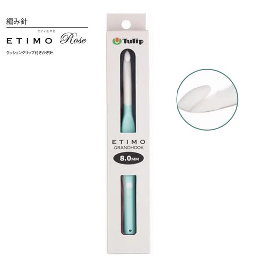 A white crochet hook with a teal handle, labeled as an "ETIMO Rose" and "Tulip" product.