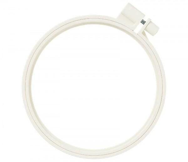 A white, circular embroidery hoop with a small attachment on the top.