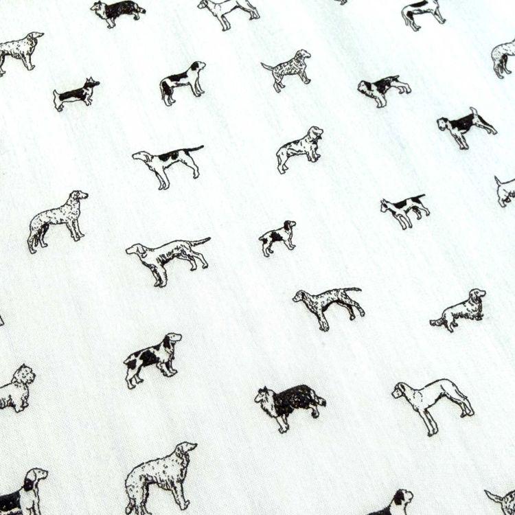 a repeating pattern of various dog breeds, including Beagles, Labradors, and others, all depicted in black and white.