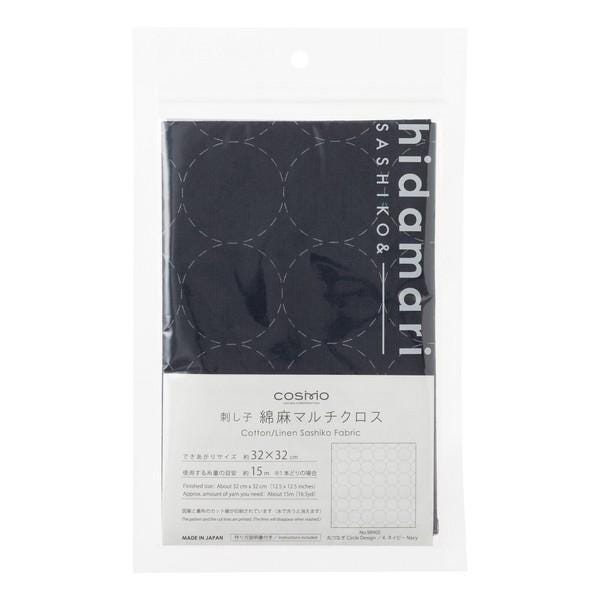 a package of a fabric product with a black circular pattern printed on it.