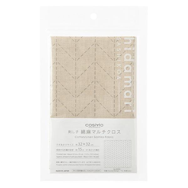 a package of fabric with a beige pattern and text in Japanese.