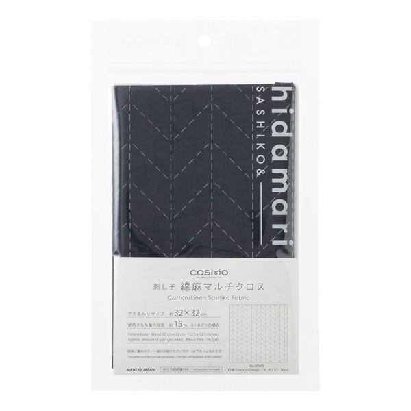 a package of a fabric product with a black and white chevron pattern.