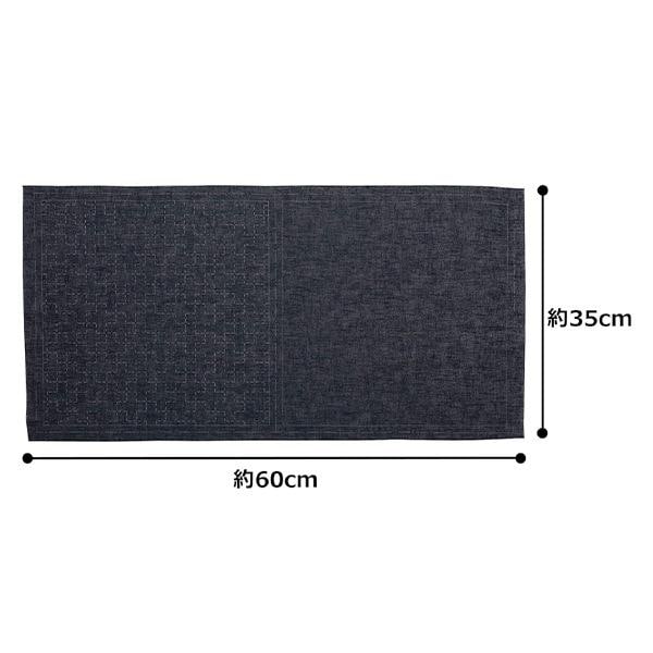 a rectangular fabric with a black and gray pattern, along with measurements indicating its length and width.