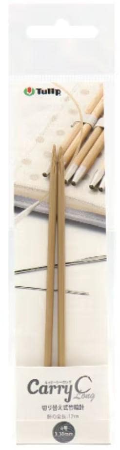 a pair of wooden knitting needles, with a focus on the needles and a background of other knitting needles.