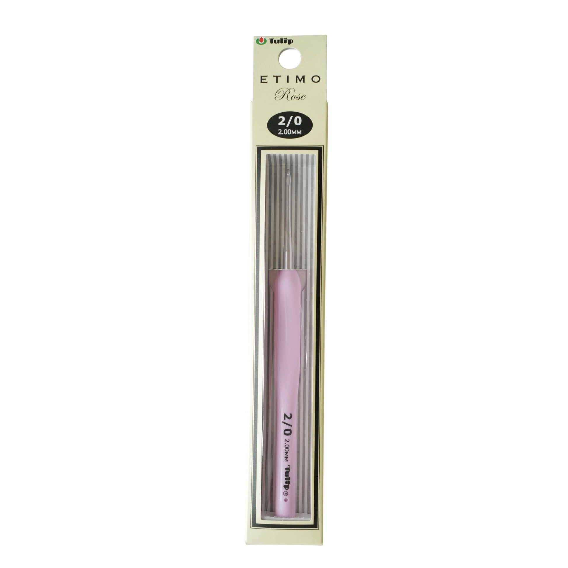 A pink crochet hook with a silver head, packaged in a white cardboard box with a black border.