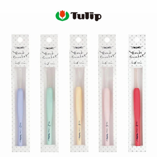 a collection of five crochet hooks in various colors, each packaged in a white box with a tulip logo.