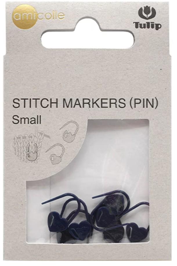 a package of small blue sewing markers, also known as pins, with a clear plastic window allowing a view of the markers inside.