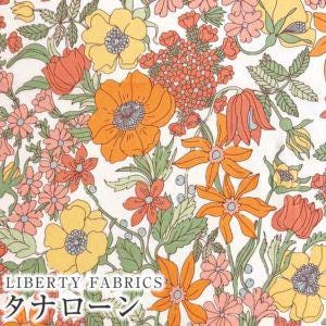 The image is a vibrant and colorful floral pattern featuring various types of flowers and leaves in shades of orange, yellow, and pink. The pattern is arranged in a repeating design, creating a visually appealing and dynamic composition.