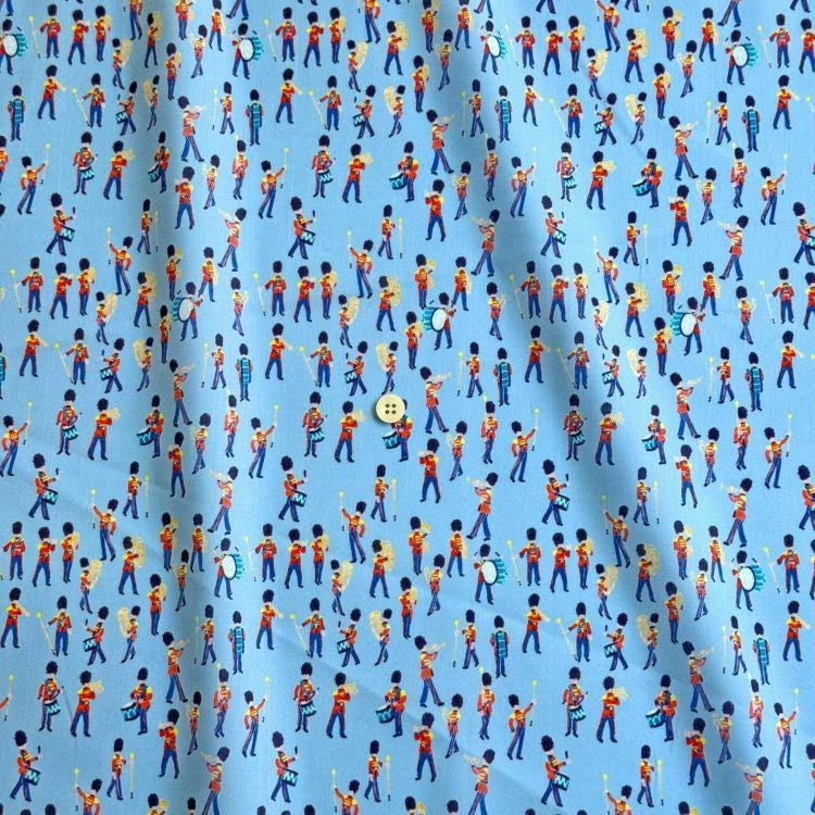 The image is a repeating pattern of various marching band members in different poses, all wearing red and blue uniforms.