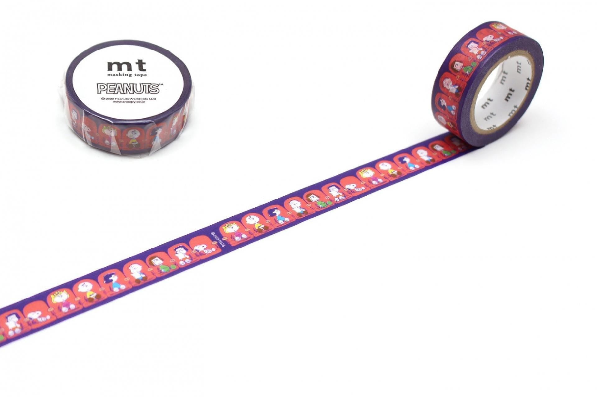 a roll of purple and red Peanuts themed tape with a repeating pattern of cartoon Peanuts characters.
