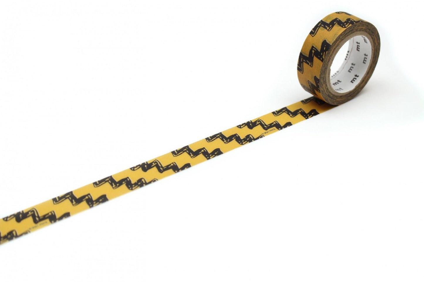 A roll of yellow and black zigzag pattern tape is lying on a white surface.