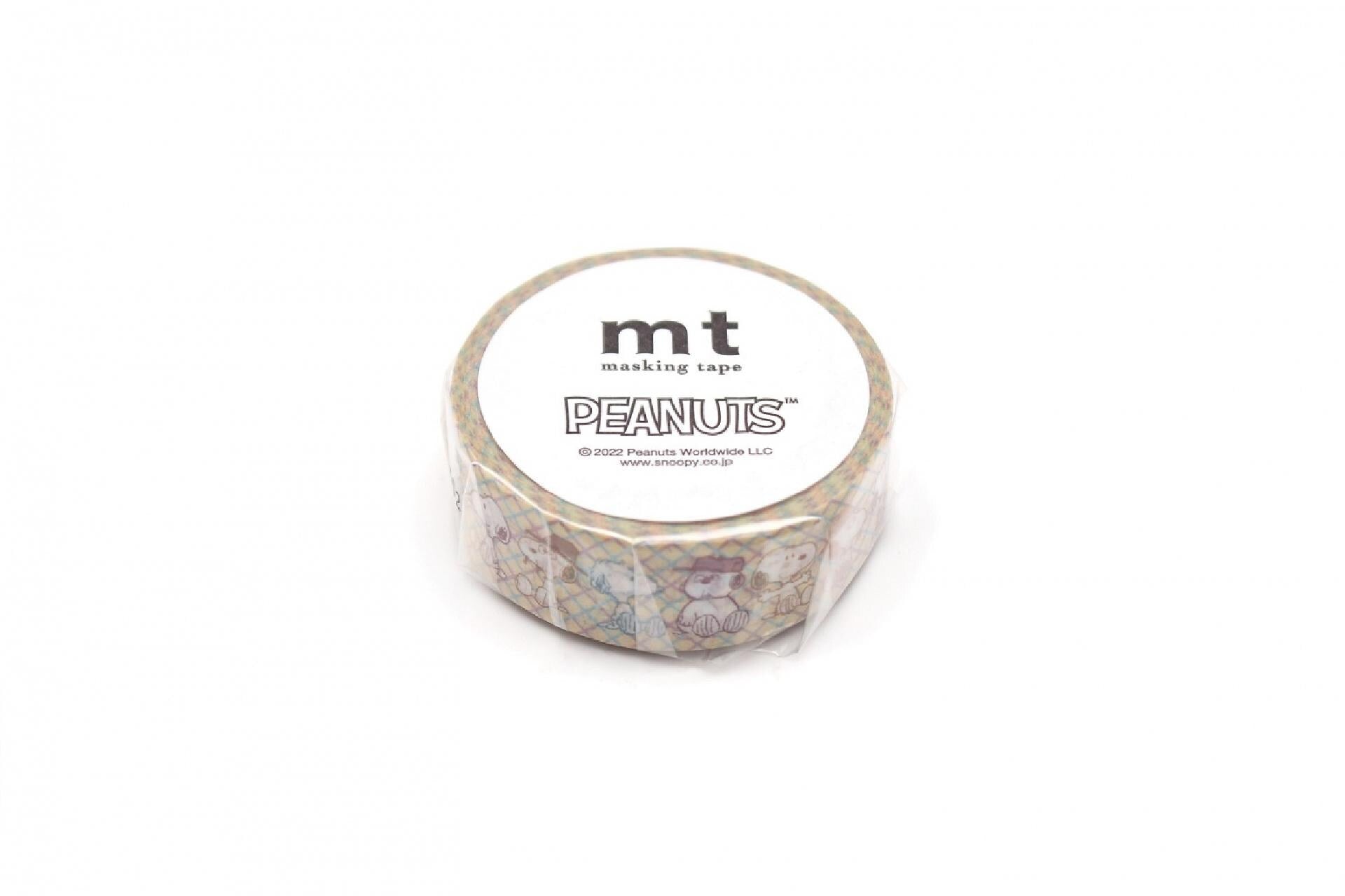 A roll of Peanuts masking tape against a white background.