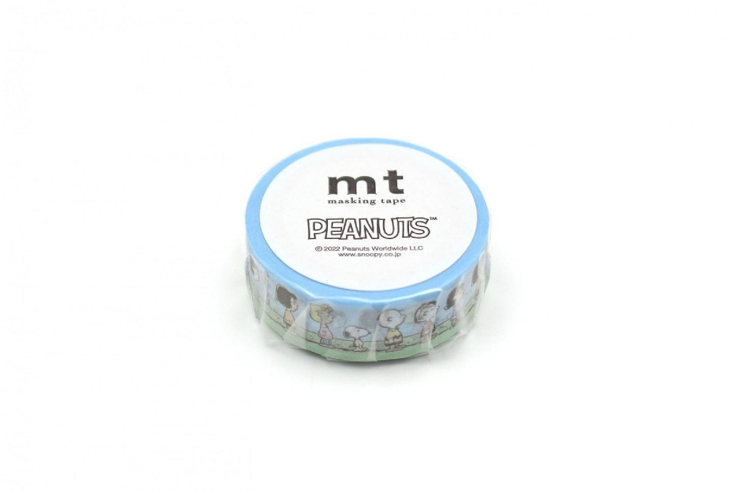 A blue and white circular object with the text "mt masking tape PEANUTS" printed on it.