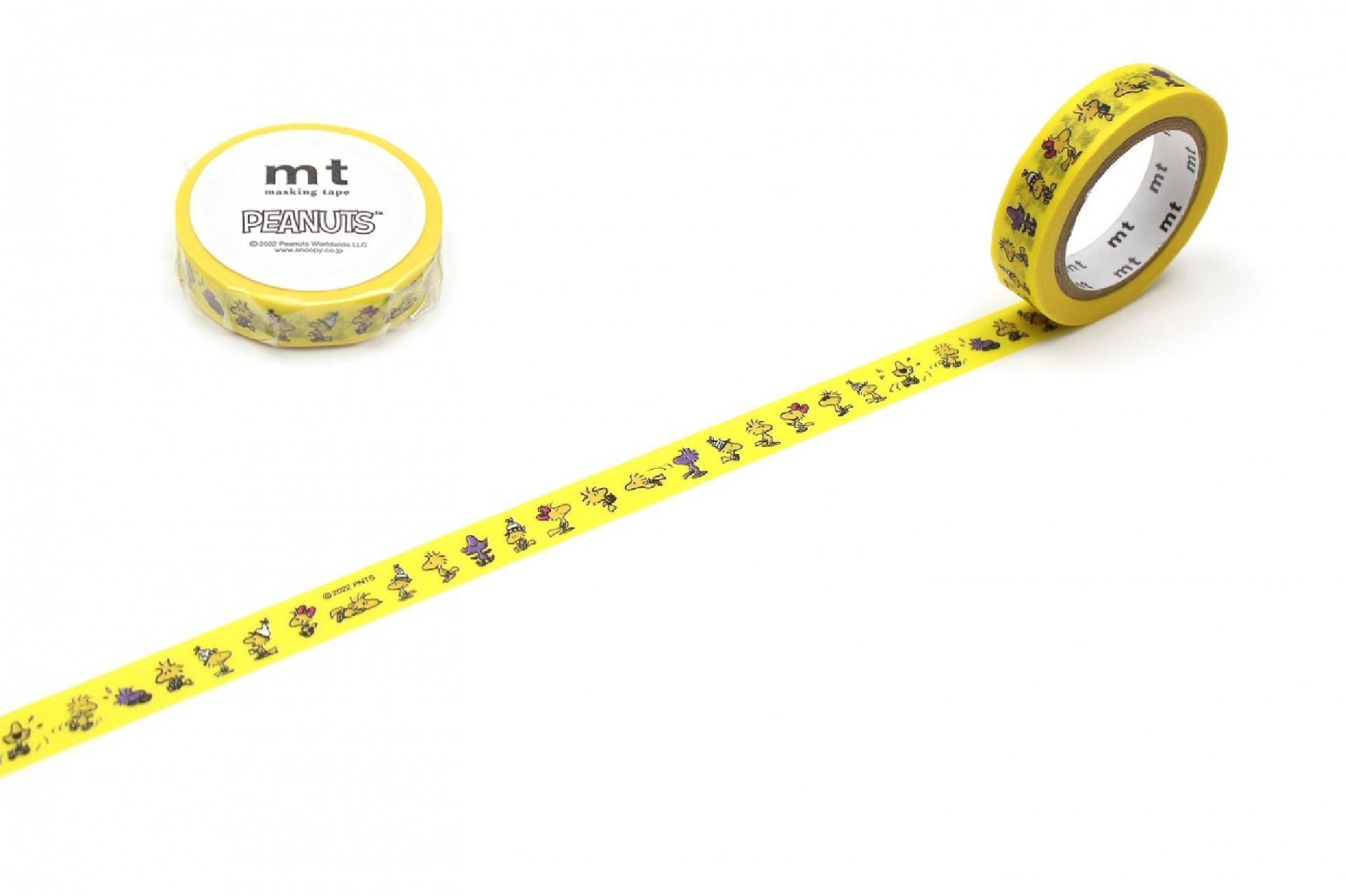 a roll of yellow Peanuts-themed tape and a yellow tape dispenser on a white background.
