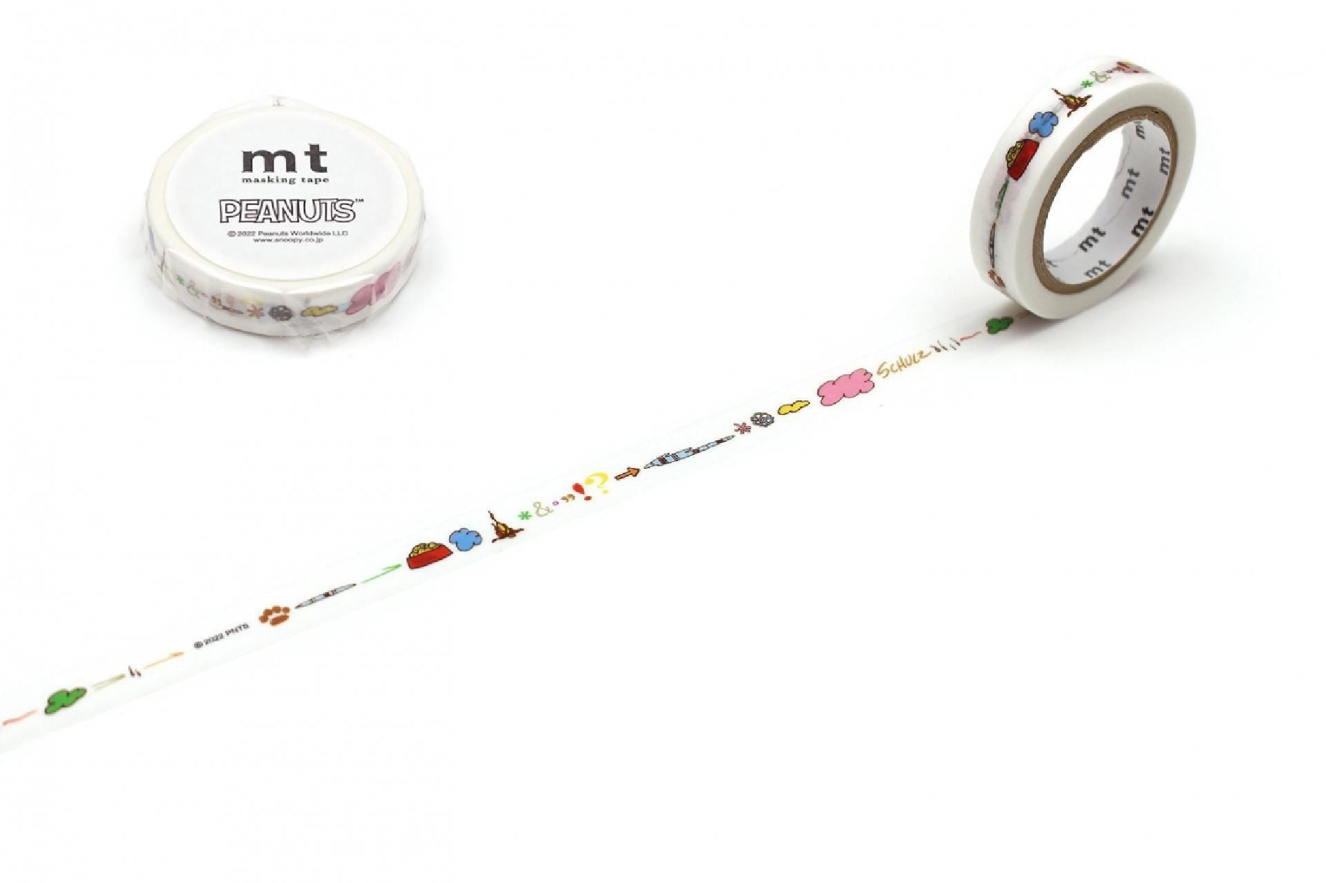 a roll of decorative tape with various colorful designs and patterns on it, along with a white circular object that appears to be a container or wrapper of the same tape.