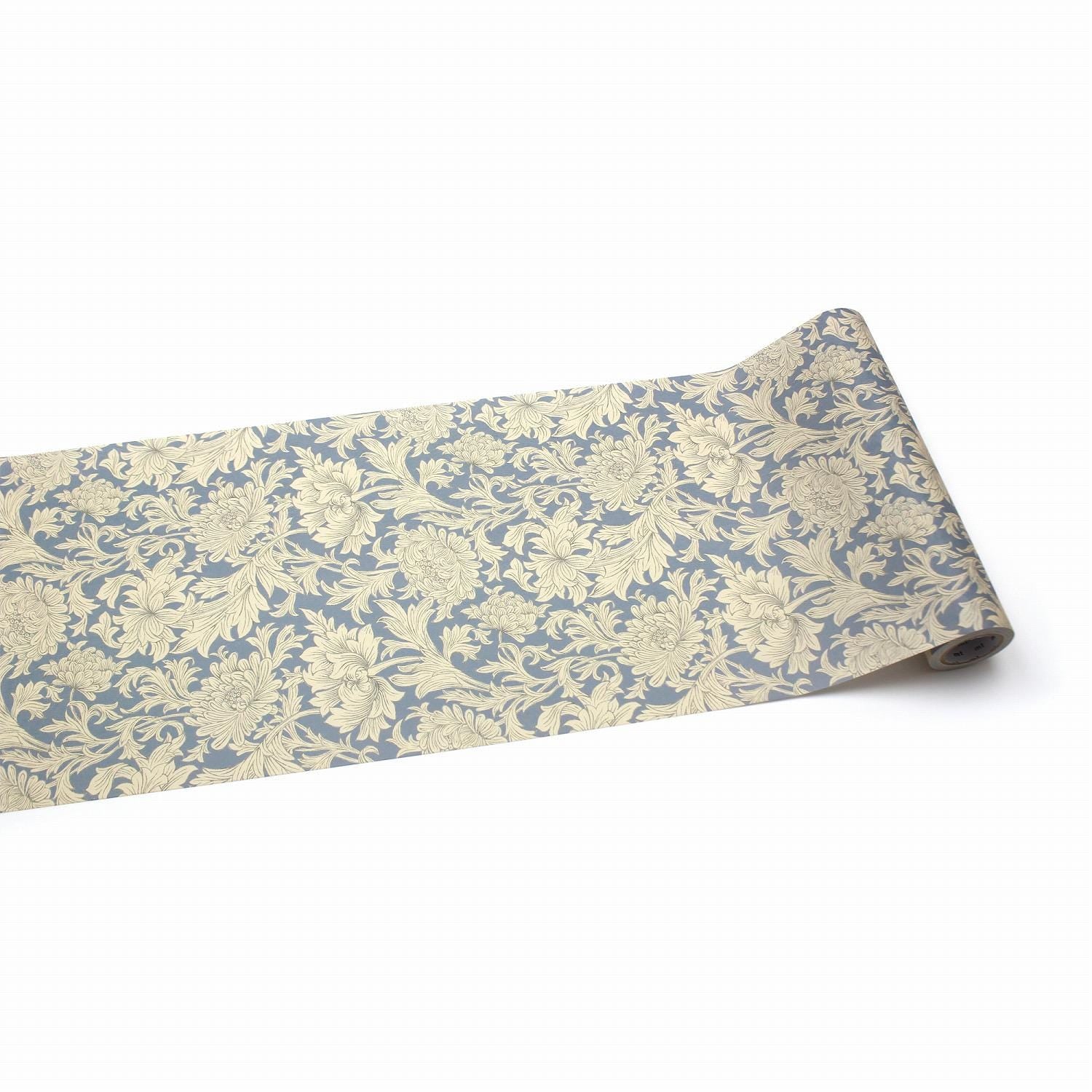 a roll of wallpaper with a floral pattern in shades of blue and beige.